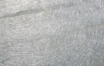 Newyears Green laminate fibreglass or shingles?